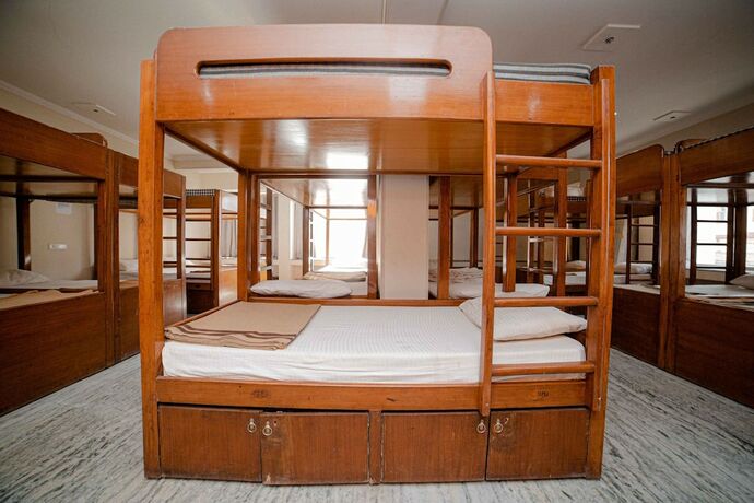 Imagen de la habitación del Hotel Pearl Courtyard Dormitory. Foto 13