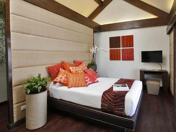 Imagen de la habitación del Hotel Pearl Farm Beach Resort. Foto 18