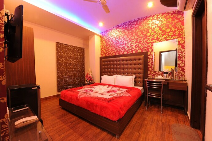 Imagen de la habitación del Hotel Pearl Inn and Suites. Foto 12