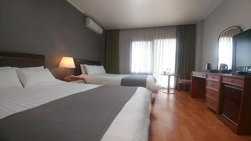 Imagen de la habitación del Hotel Pearl Jeju. Foto 16