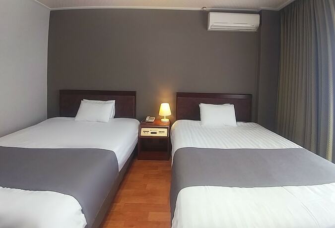 Imagen de la habitación del Hotel Pearl Jeju. Foto 19