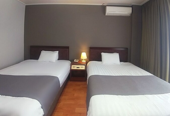 Imagen de la habitación del Hotel Pearl Jeju. Foto 22