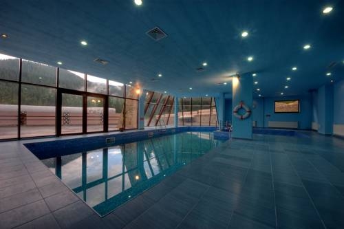 Imagen de la piscina del Hotel Pearl Lodge. Foto 38