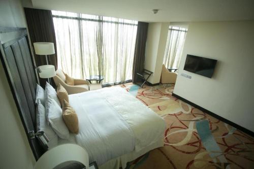 Imagen de la habitación del Hotel Pearl Of Africa Kampala. Foto 18