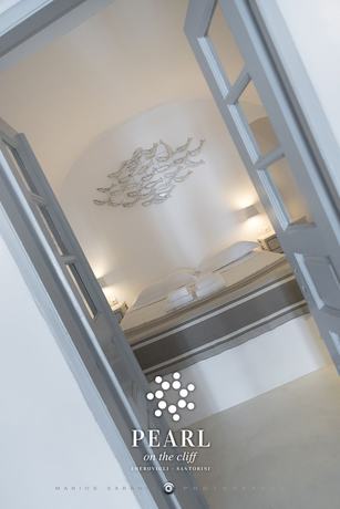 Imagen de la habitación del Hotel Pearl On The Cliff and Suites. Foto 7