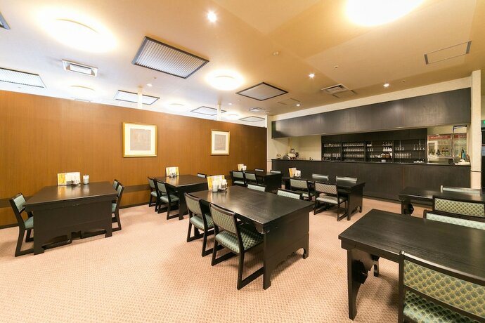 Imagen del bar/restaurante del Hotel Pearl Ota, Ota. Foto 15