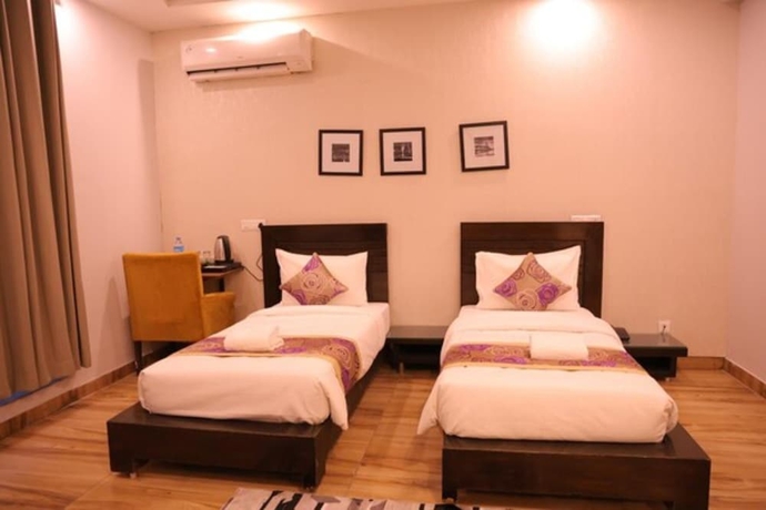 Imagen de la habitación del Hotel Pearl Pavilion Nr Medanta By OTABoostup. Foto 9