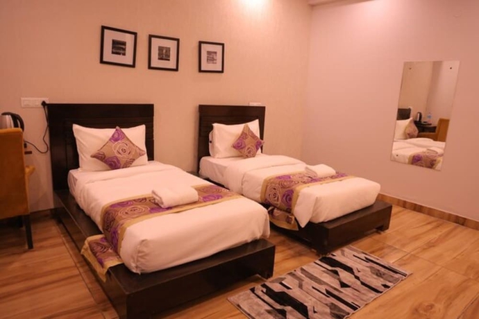 Imagen de la habitación del Hotel Pearl Pavilion Nr Medanta By OTABoostup. Foto 10