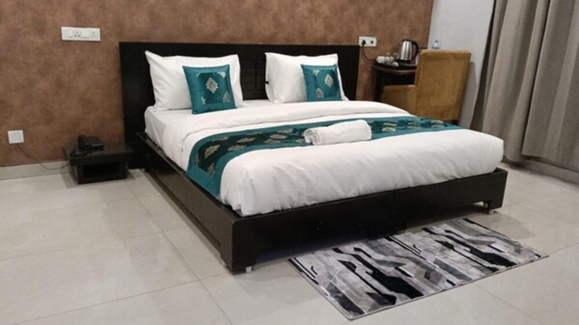 Imagen de la habitación del Hotel Pearl Pavilion Nr Medanta By OTABoostup. Foto 12