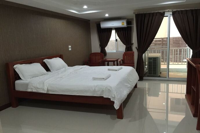 Imagen de la habitación del Hotel Pearl Residence Serviced Apartment. Foto 12