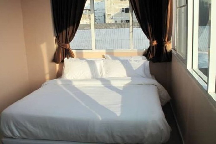 Imagen de la habitación del Hotel Pearl Residence Serviced Apartment. Foto 16
