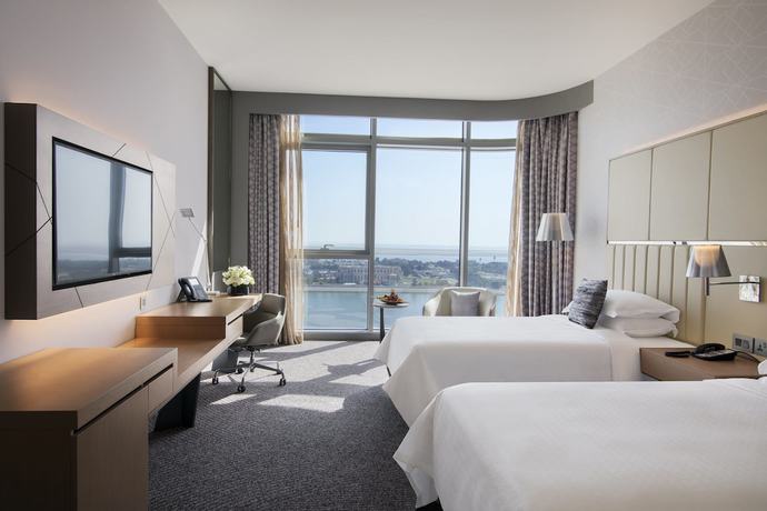 Imagen de la habitación del Hotel Pearl Rotana Capital Centre. Foto 18