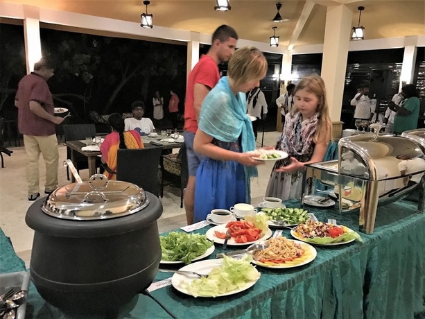 Imagen del bar/restaurante del Hotel Pearl Sands Of Maldives. Foto 8