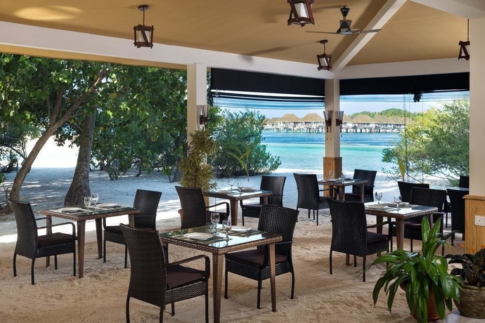 Imagen del bar/restaurante del Hotel Pearl Sands Of Maldives. Foto 10