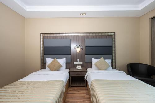 Imagen de la habitación del Hotel Pearl Swiss. Foto 19