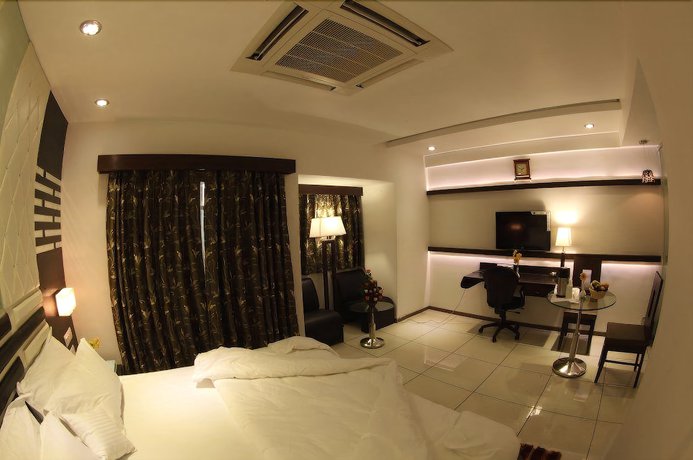 Imagen de la habitación del Hotel Pearl and Banquets. Foto 10