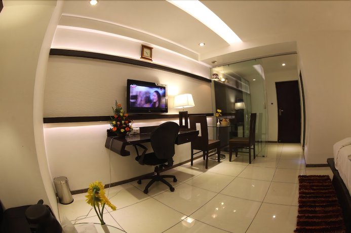 Imagen de la habitación del Hotel Pearl and Banquets. Foto 11