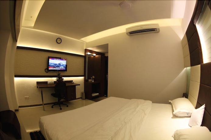 Imagen de la habitación del Hotel Pearl and Banquets. Foto 14