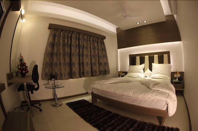 Imagen de la habitación del Hotel Pearl and Banquets. Foto 17