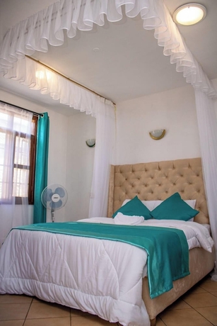 Imagen de la habitación del Hotel Pearldew. Foto 7