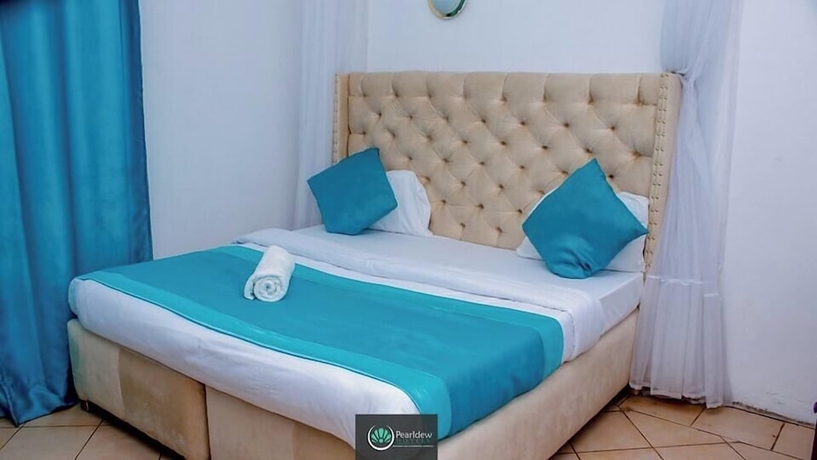 Imagen de la habitación del Hotel Pearldew. Foto 8
