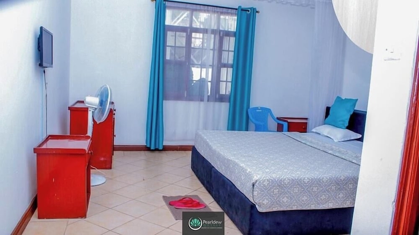 Imagen de la habitación del Hotel Pearldew. Foto 11
