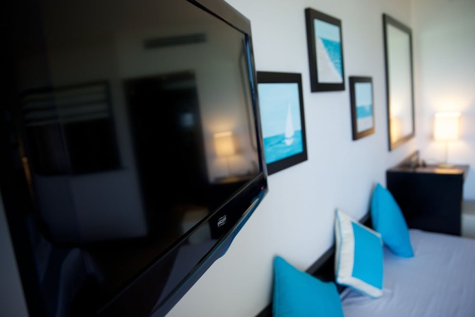 Imagen de la habitación del Hotel Pearle Beach Resort and Spa. Foto 7