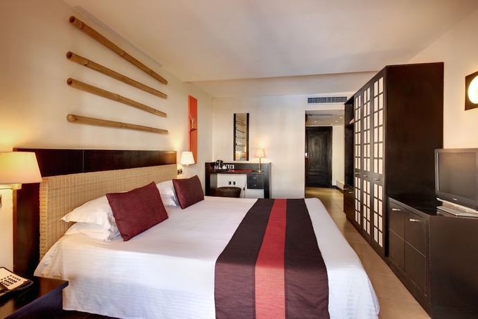 Imagen de la habitación del Hotel Pearle Beach Resort and Spa. Foto 9