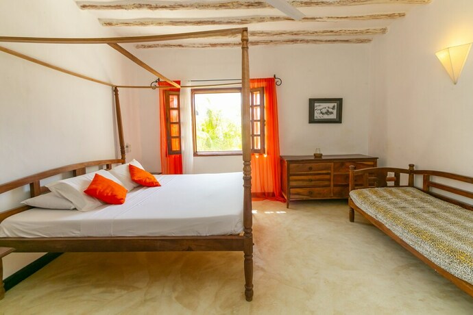 Imagen de la habitación del Hotel Pearls and Corals Resort. Foto 20