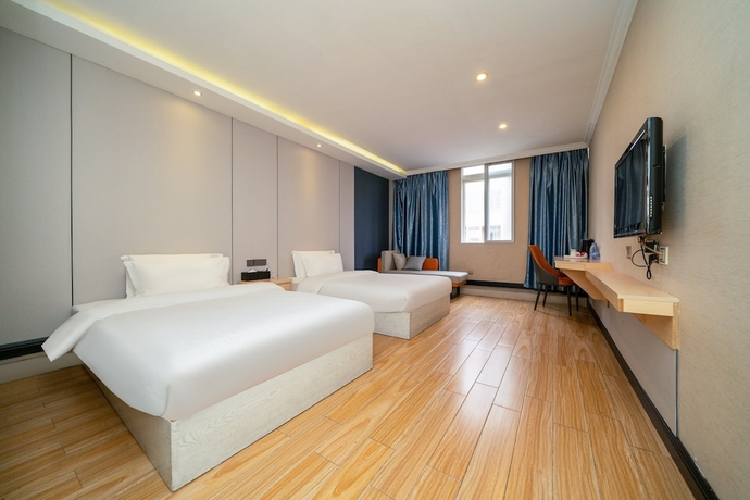 Imagen de la habitación del Hotel Pebble Motel Zhangzhou Gucheng. Foto 11
