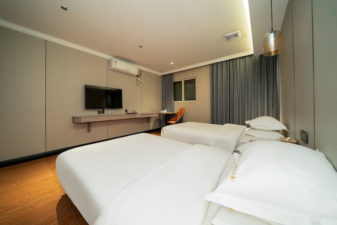 Imagen de la habitación del Hotel Pebble Motel Zhangzhou Gucheng. Foto 15