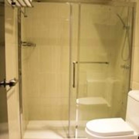 Imagen de la habitación del Hotel Pebbles Inn. Foto 9