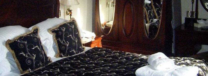 Imagen de la habitación del Hotel Peckforton Castle. Foto 8