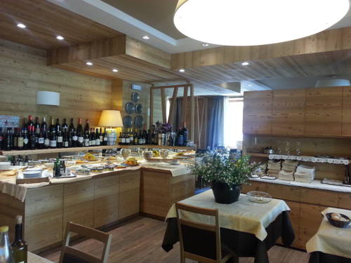 Imagen de la habitación del Hotel Pedretti. Foto 16