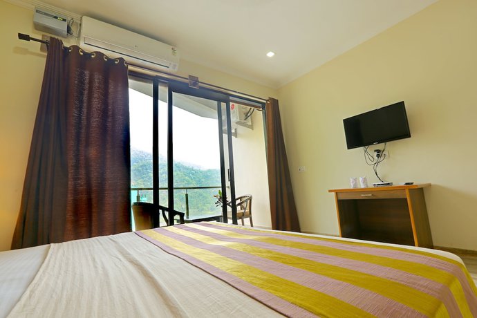 Imagen de la habitación del Hotel Peepal Tree, Rishikesh. Foto 5