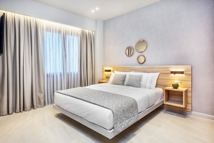 Imagen de la habitación del Hotel Pefki Deluxe Residences. Foto 18