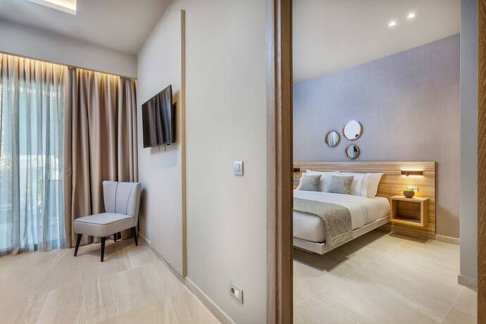 Imagen de la habitación del Hotel Pefki Deluxe Residences. Foto 19