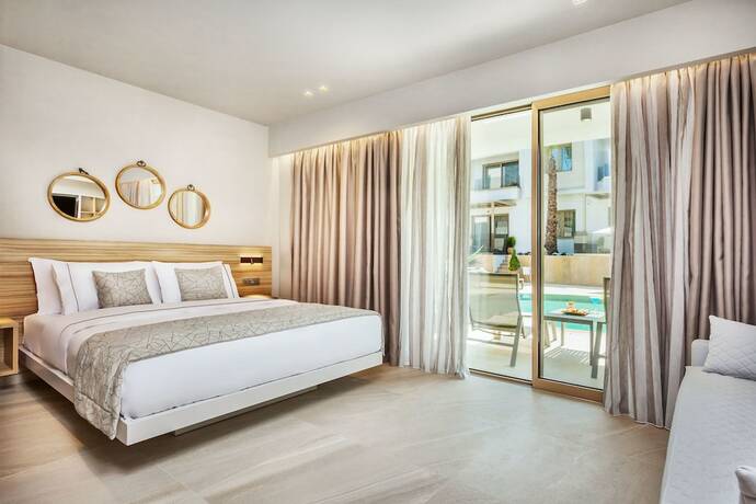 Imagen de la habitación del Hotel Pefki Deluxe Residences. Foto 20