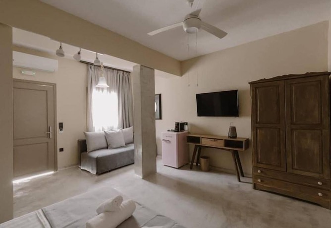Imagen de la habitación del Hotel Pefkon Suites. Foto 6