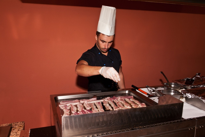 Imagen del bar/restaurante del Hotel Pegasos Deluxe Beach. Foto 3