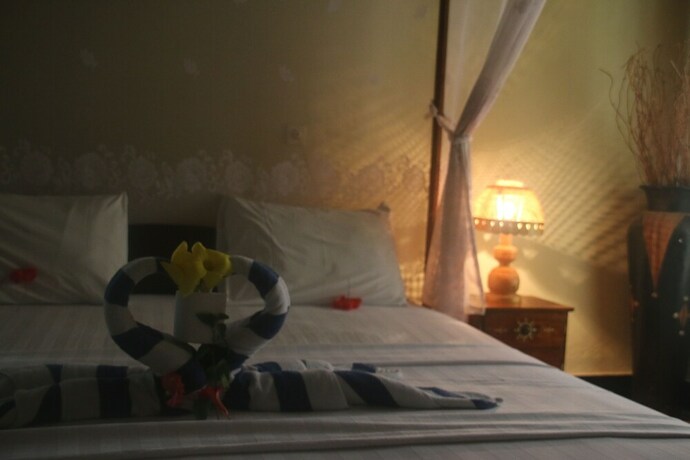 Imagen de la habitación del Hotel Pelangi Cottages and Restaurant. Foto 16