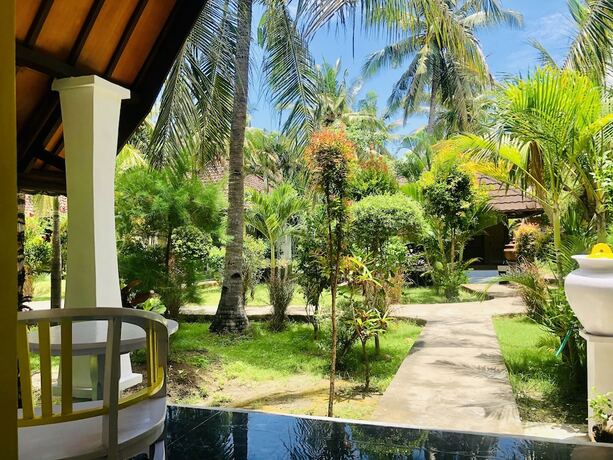 Imagen de la habitación del Hotel Pelangi Cottages and Restaurant. Foto 19