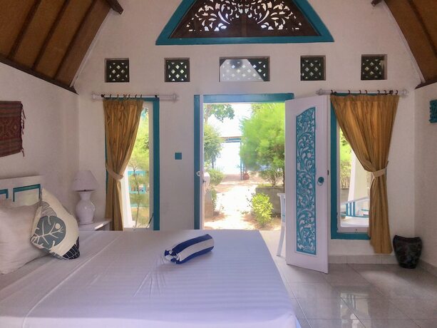 Imagen de la habitación del Hotel Pelangi Cottages and Restaurant. Foto 20