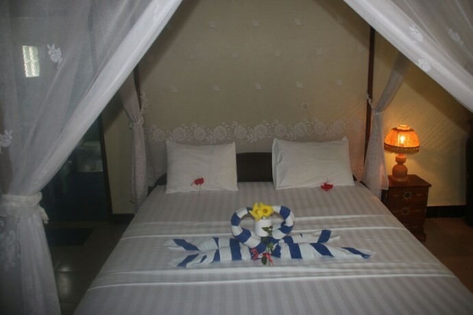 Imagen de la habitación del Hotel Pelangi Cottages and Restaurant. Foto 21