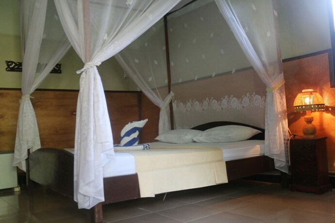 Imagen de la habitación del Hotel Pelangi Cottages and Restaurant. Foto 28