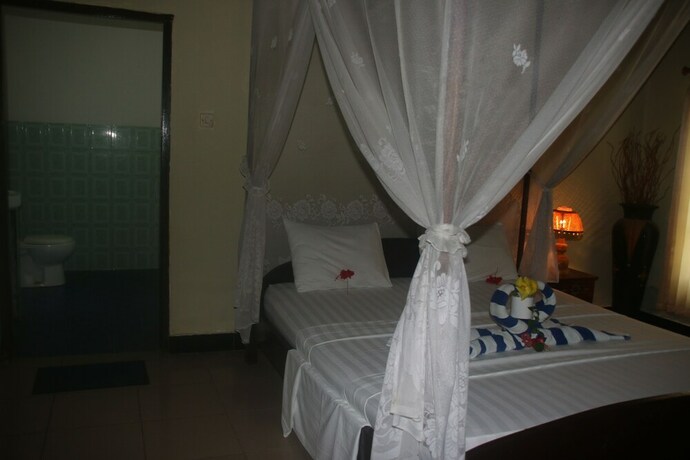 Imagen de la habitación del Hotel Pelangi Cottages and Restaurant. Foto 30