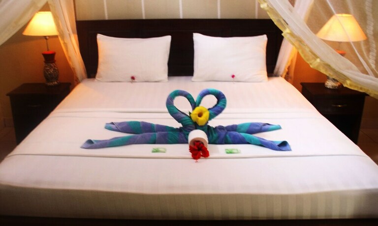 Imagen de la habitación del Hotel Pelangi Cottages and Restaurant. Foto 32
