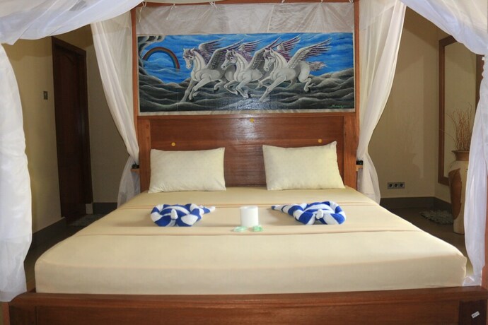 Imagen de la habitación del Hotel Pelangi Cottages and Restaurant. Foto 33