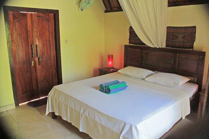 Imagen de la habitación del Hotel Pelangi Cottages and Restaurant. Foto 36