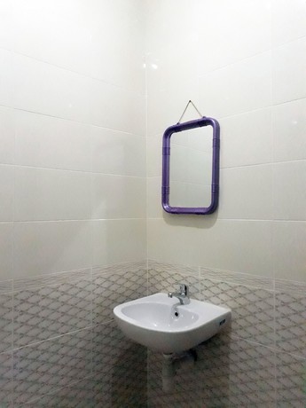 Imagen de la habitación del Hotel Pelangi Indah. Foto 9